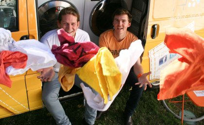 Lucas Patchett (left) and Nic Marchesi ... converted an old van into a mobile laundromat and now washing 200 loads a week.